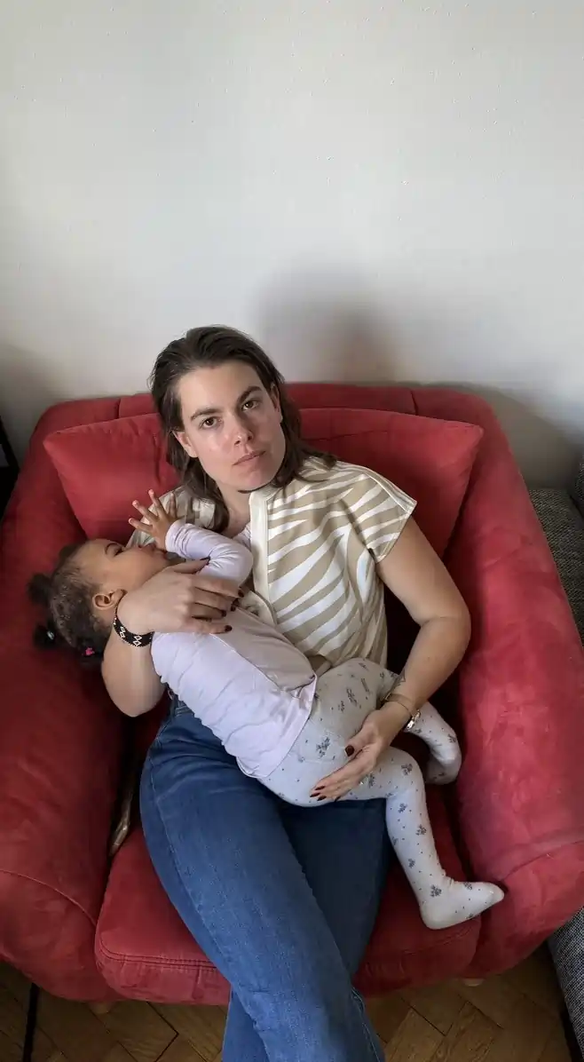 My lovely wife Vreni cuddling our first born daughter to sleep